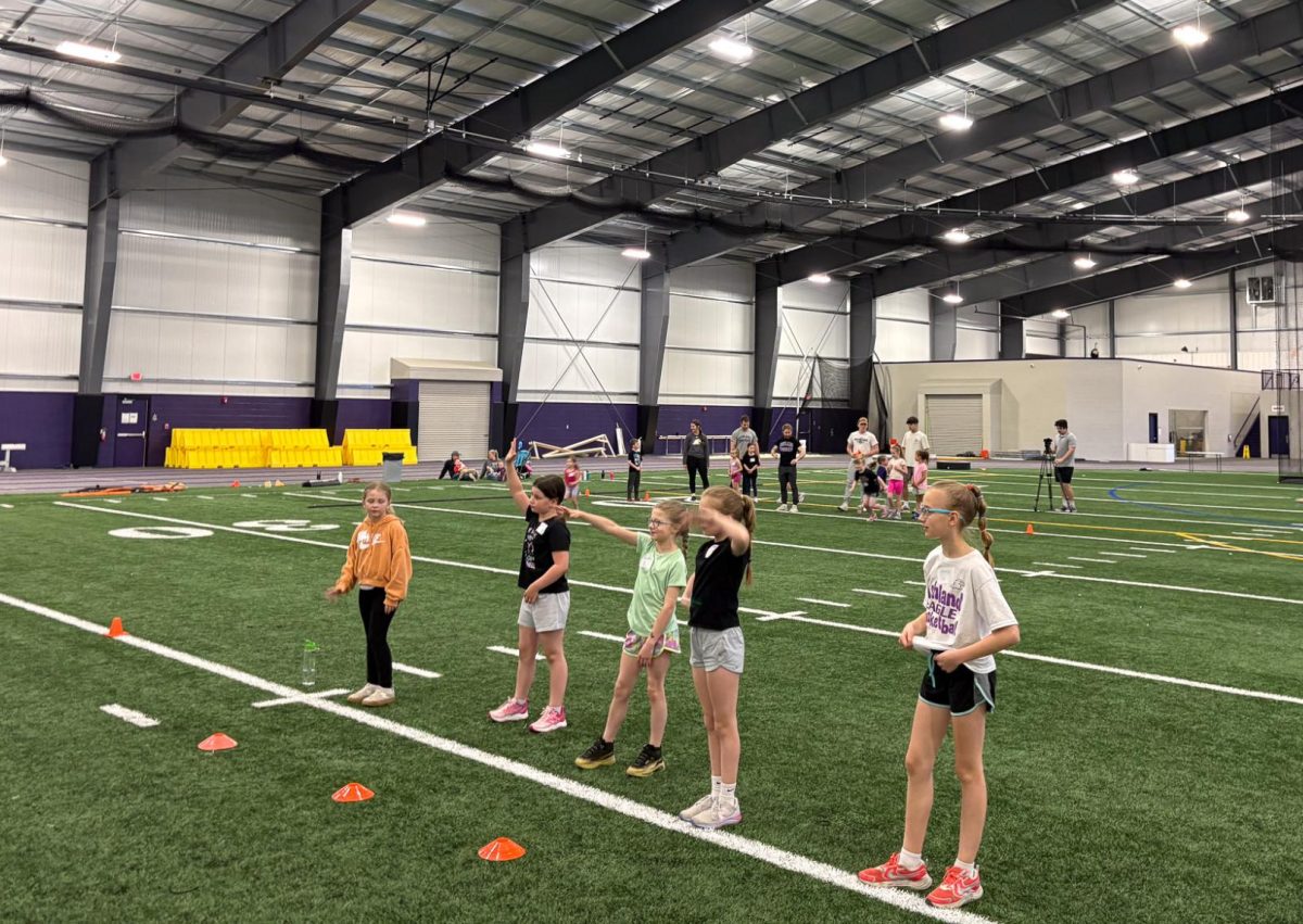 Young girls competed in a variety of drills and activities related to different sports.
