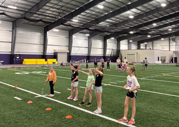 Young girls competed in a variety of drills and activities related to different sports.